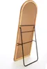 The back of a floor mirror with a woven frame and a black metal stand. Náhled obrázku produktu