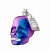 A skull-shaped perfume bottle with a tag attached. Podgląd zdjęcia produktu