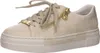 A single beige sneaker with gold accents is shown from a side-front angle against a white background. Náhled obrázku produktu