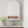 A bathroom vanity with a sink and a medicine cabinet. Anteprima dell’immagine prodotto