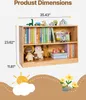 A wooden bookshelf filled with books and stuffed animals, with dimensions indicated by lines and numbers. Podgląd zdjęcia produktu
