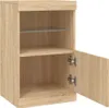 A close-up view of an open wooden cabinet with a glass shelf and a wooden shelf. Produktbild-Vorschau