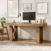 A wooden desk with a computer and accessories in a home office setting. Anteprima dell’immagine prodotto