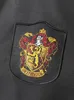 A close-up of a Gryffindor crest patch on a black fabric. Produktbild-Vorschau