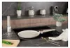 A kitchen counter with cooking utensils and appliances. Produktbild-Vorschau