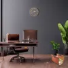 A modern office setting with a desk, chair, computer, and plants. Produktbild-Vorschau