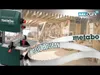 A woodworking workshop with a bandsaw and a large saw blade. Anteprima dell’immagine prodotto