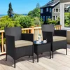 A patio set with two chairs and a small table on a wooden deck, with a house and greenery in the background. Produktbild-Vorschau
