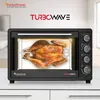 A black TurboTronic oven with a rotisserie chicken inside, placed on a white countertop. Produktbild-Vorschau
