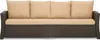 A studio shot of a sofa with beige cushions and a dark brown base. Anteprima dell’immagine prodotto