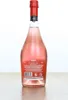 A bottle of Martini Bellini on a wooden surface against a white background. Voir les images du produit
