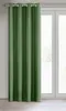 A green curtain hanging in front of a window. Anteprima dell’immagine prodotto