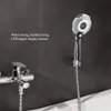 A modern bathroom setting with a chrome faucet and a digital LED showerhead mounted on a dark tiled wall. Produktbild-Vorschau