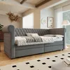 A modern bedroom or living room with a grey upholstered daybed. Produktbild-Vorschau
