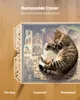 A cat is lying on a puzzle board with a removable cover, showcasing its features. Produktbild-Vorschau