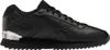 A side view of a black Reebok shoe with a silver heel accent. Voir les images du produit