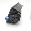 A close-up of a black printer toner cartridge with a blue lever, set against a white background. Produktbild-Vorschau