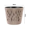A beige planter with a decorative wavy pattern is shown against a white background, with dimensions indicated by measurement lines and text. Anteprima dell’immagine prodotto