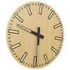A close-up view of a wooden wall clock with a light wood grain face, black hands, and luminous hour markers. Náhled obrázku produktu