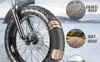 A close-up of an electric bicycle tire with three circular insets showing different road surfaces: gravel, dirt, and a snowy landscape. Produktbild-Vorschau