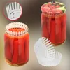 A collage of images showing glass jars with red contents, likely preserved food, and white plastic fermentation weights. Anteprima dell’immagine prodotto