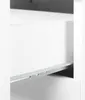 A close-up view of a white drawer with metal drawer slides. Produktbild-Vorschau