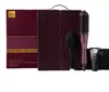 A GHD Duet Blowdry Professional 2-in-1 hair dryer brush set is displayed against a white background. The set includes the hair dryer brush, a paddle brush, a styling cream, and a protective case. The packaging is also visible. Produktbild-Vorschau