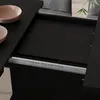 A close-up view of an extendable dining table with two bowls on the surface. Podgląd zdjęcia produktu