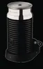 A black Nespresso milk frother on a black base against a black background. Produktbild-Vorschau