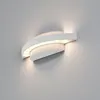 A white LED outdoor wall light mounted on a light gray wall. Produktbild-Vorschau