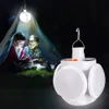 Two children are inside a tent at night, reading a book illuminated by a hanging solar lantern. Anteprima dell’immagine prodotto