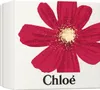 A close-up of a red flower with gold accents on a white background, with the brand name 'Chloé' visible at the bottom. Anteprima dell’immagine prodotto