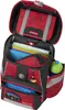 An open red and black children's backpack with various school supplies inside. Anteprima dell’immagine prodotto