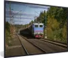 MuchoWow® Gerahmtes Poster Ein Zug auf einer Bahnstrecke Produktbild-Vorschau 1