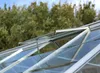 Close-up view of an open roof window of a greenhouse. Produktbild-Vorschau