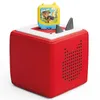 A red cube-shaped toy with a yellow and blue screen on top, featuring a cartoon character. Produktbild-Vorschau