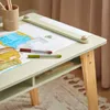 Close-up of a child's desk with drawing supplies. Produktbild-Vorschau