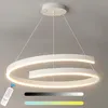 A modern white LED pendant light with a spiral design, suspended from the ceiling. Produktbild-Vorschau
