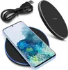 A smartphone is placed on a wireless charger, with a USB cable in the background. Produktbild-Vorschau