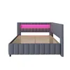 A gray upholstered bed frame with a pink LED light strip on the headboard, shown from the side against a white background. Náhled obrázku produktu