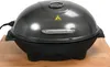 A dark gray electric grill with a silver handle and a thermometer on top, placed on a wooden surface. Produktbild-Vorschau