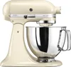 A close-up studio shot of a cream-colored KitchenAid Artisan stand mixer with a silver bowl. Produktbild-Vorschau