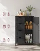 A dark gray bathroom cabinet with an open door, revealing shelves filled with various bottles and containers. The cabinet has four drawers on the left side. On the wall to the left, there are graphic icons representing toiletries. The top of the cabinet di Náhled obrázku produktu