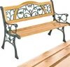 A garden bench with wooden slats and ornate green metalwork. Náhled obrázku produktu