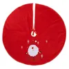 A red Christmas tree skirt with a Santa Claus design and snowflakes. Produktbild-Vorschau
