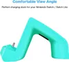 A teal charging dock for a Nintendo Switch or Switch Lite. Produktbild-Vorschau