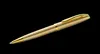 A gold pen is shown against a black background. Voir les images du produit