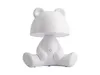 A white bear-shaped table lamp is shown against a white background. Náhled obrázku produktu