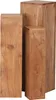Three wooden pedestals of varying heights are arranged together. Produktbild-Vorschau