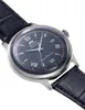 A close-up, angled view of a blue Orient watch with a silver case and a dark blue leather strap. Produktbild-Vorschau